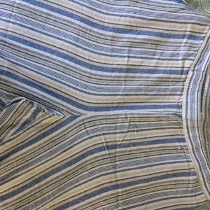 Woman Within Blue and White Striped Pants